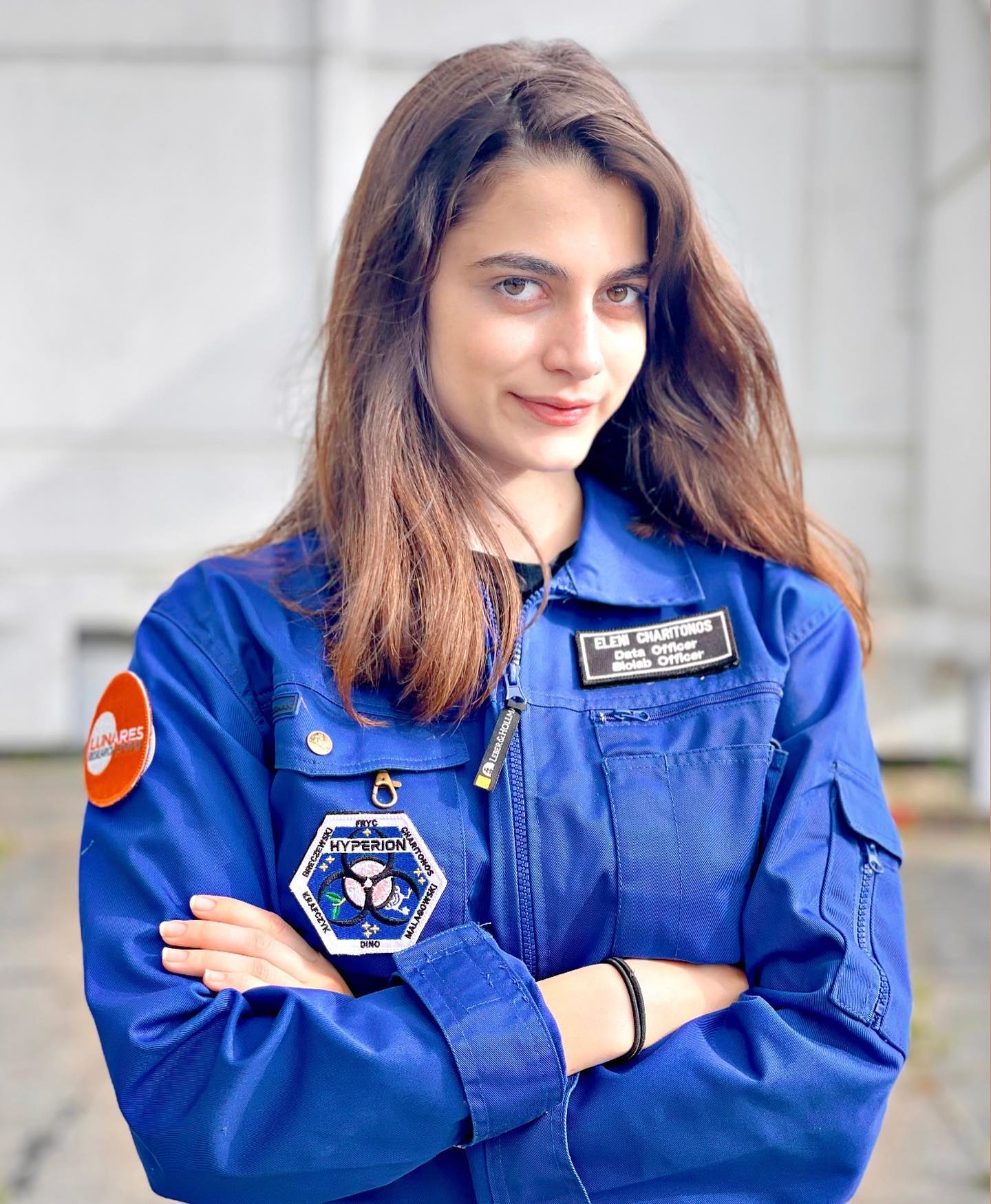 feature gina eleni wearing the blue uniform with the hyperion symbol