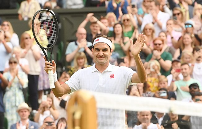 image Federer gets his sparkle back as sun shines at Wimbledon