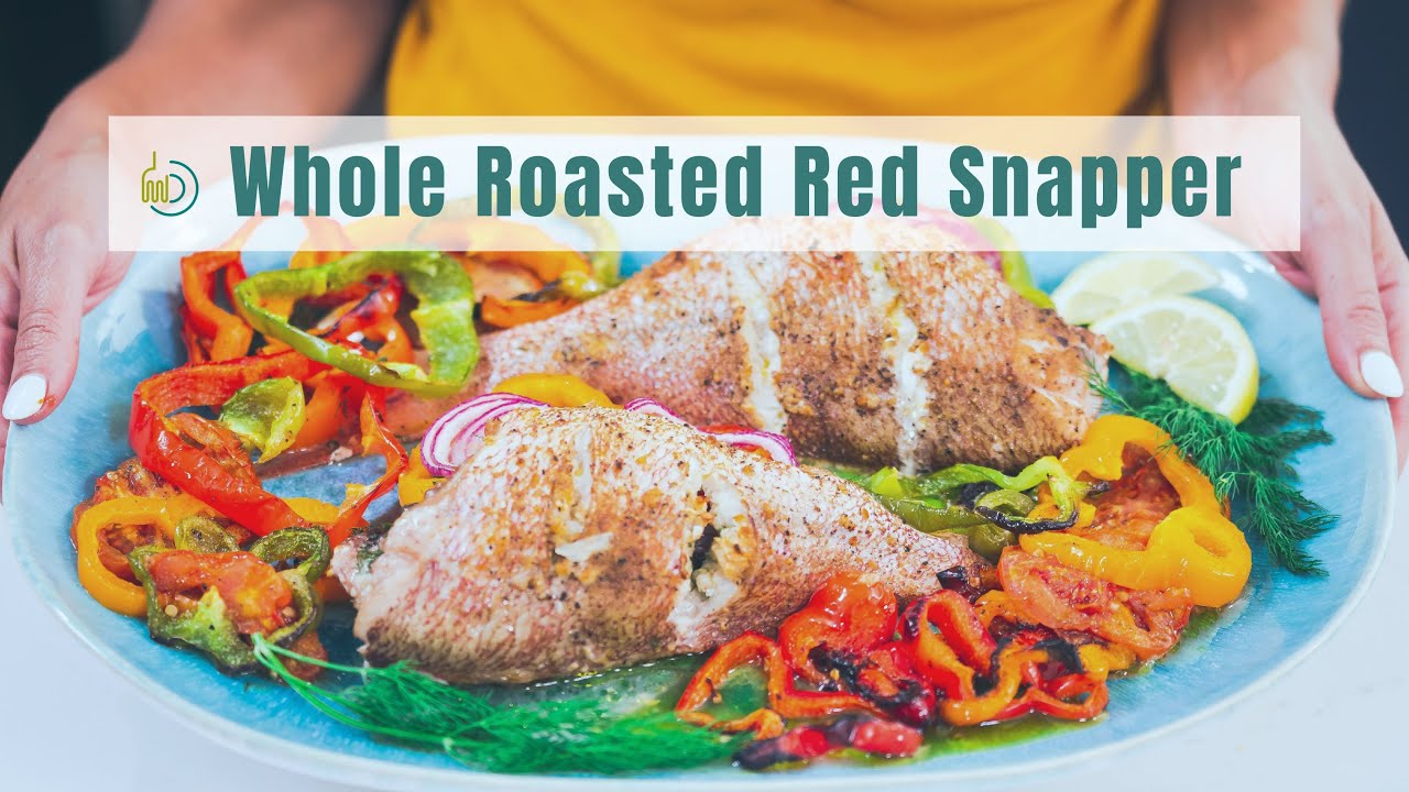 image Roasted red snapper with peppers, onions and tomatoes