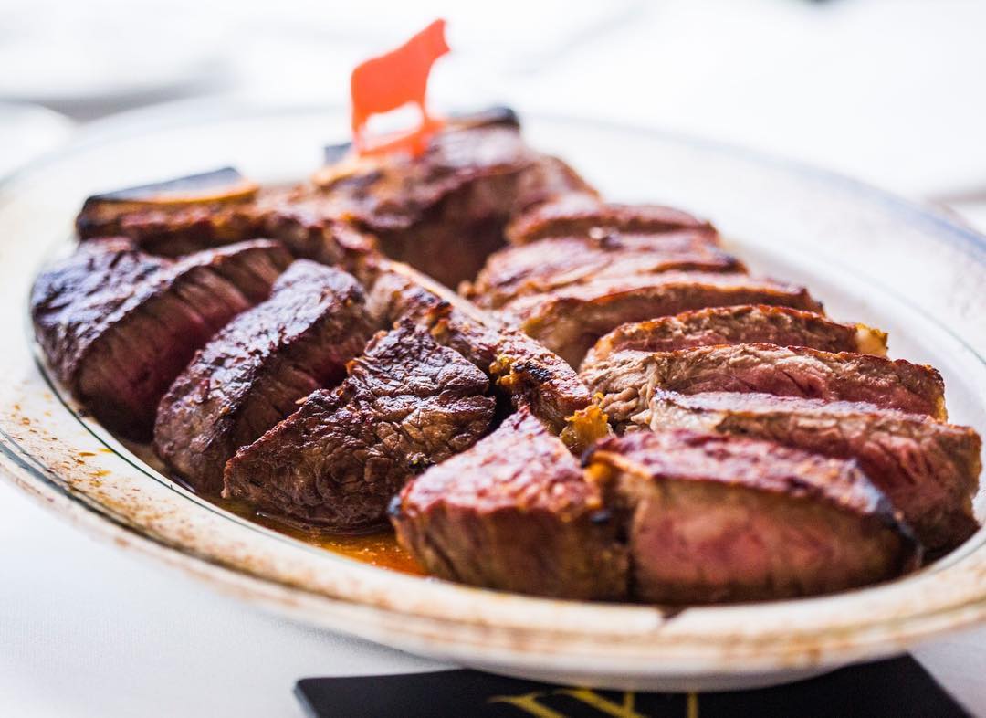 wolfgang's signature usda prime dry aged black angus porterhouse steak