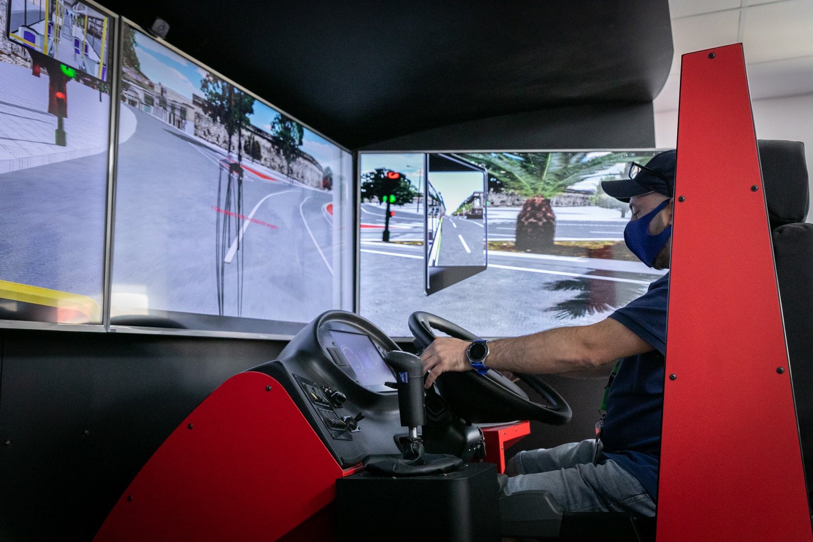 feature antigoni one of the journalists has a go on the bus simulator