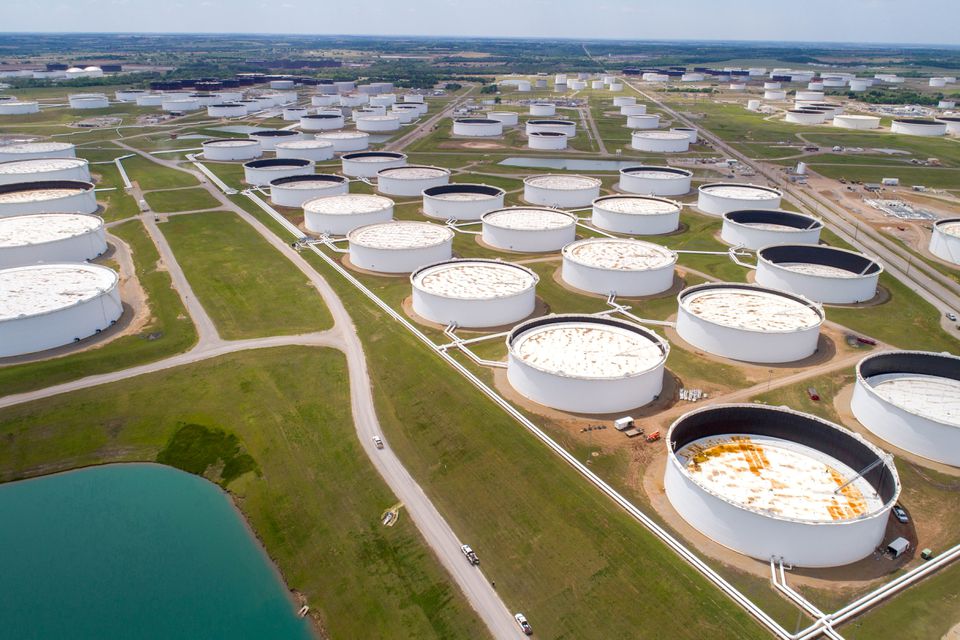 image Oil rises on Mideast tensions but virus concerns weigh