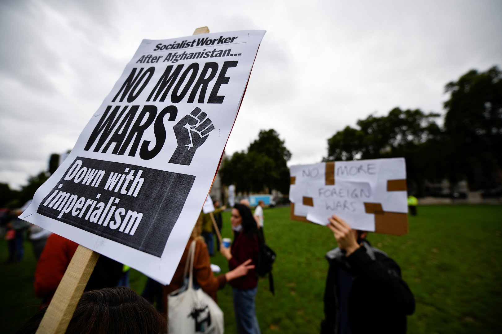 image UK lawmakers condemn PM Johnson and US President Biden over Afghanistan