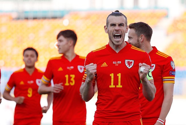 image Bale’s hat-trick snatches Wales victory in Belarus