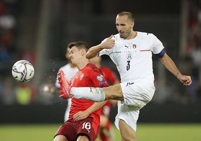 image Italy equal unbeaten world record with Swiss draw