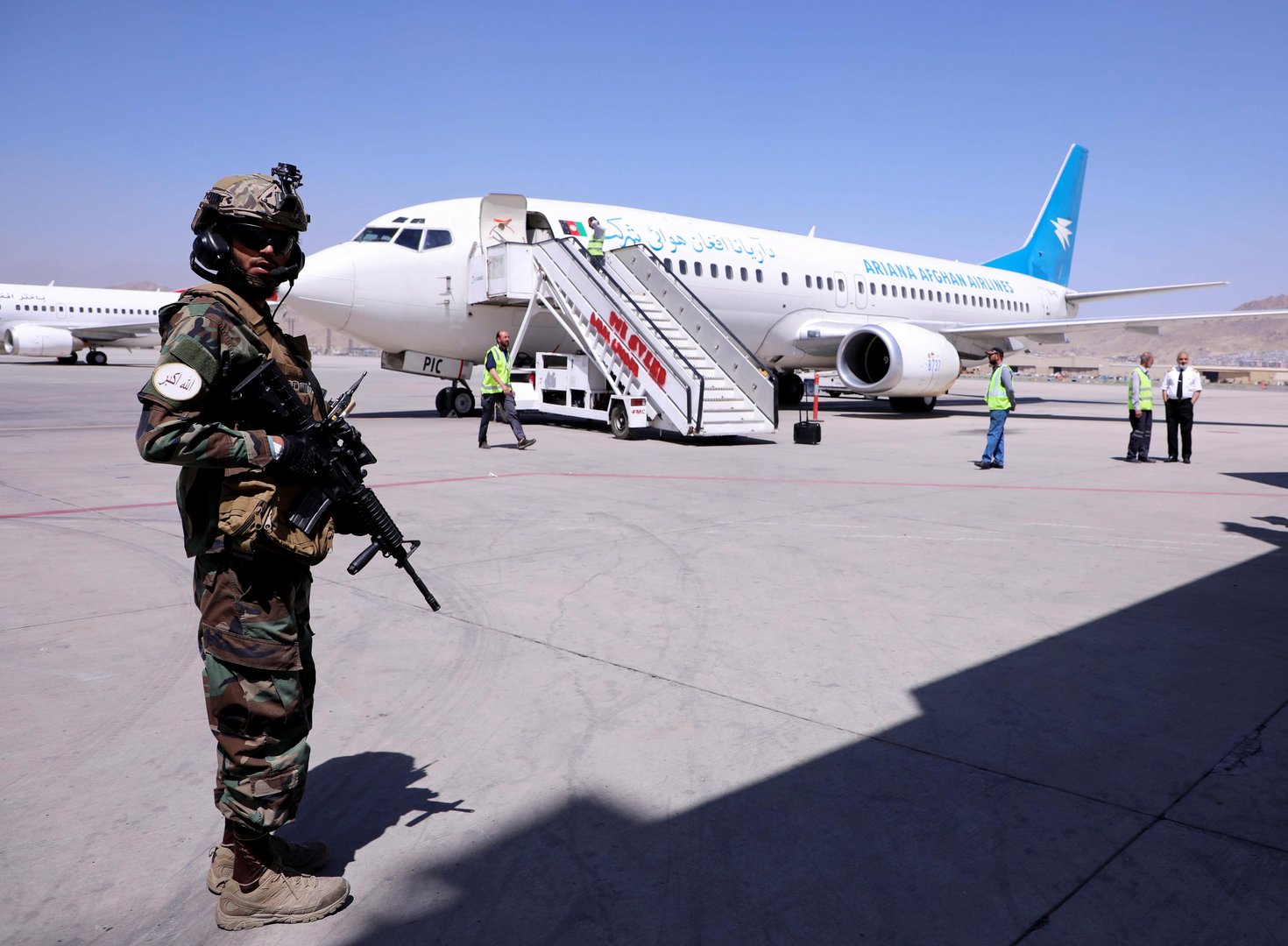 image Taliban interim government agrees to let foreigners leave Afghanistan