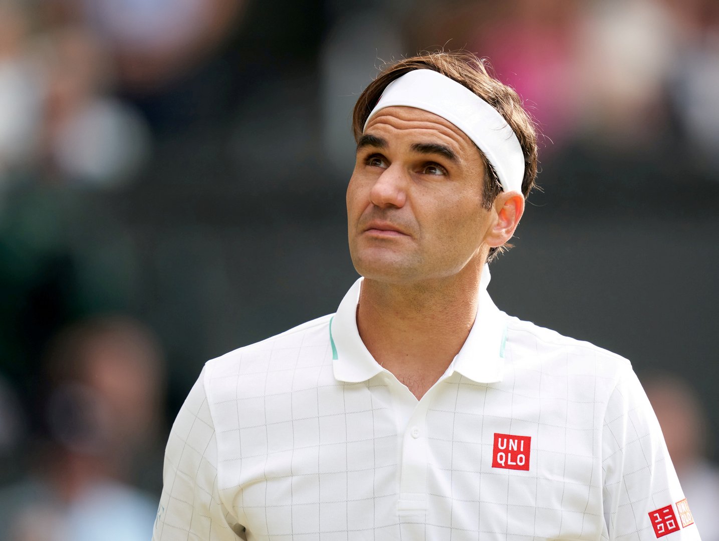 image Federer calls for evolution in player-media relationship