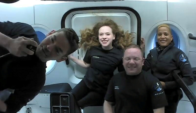 inspiration4 crew seen on their first day in space in this handout photo released on september 17, 2021