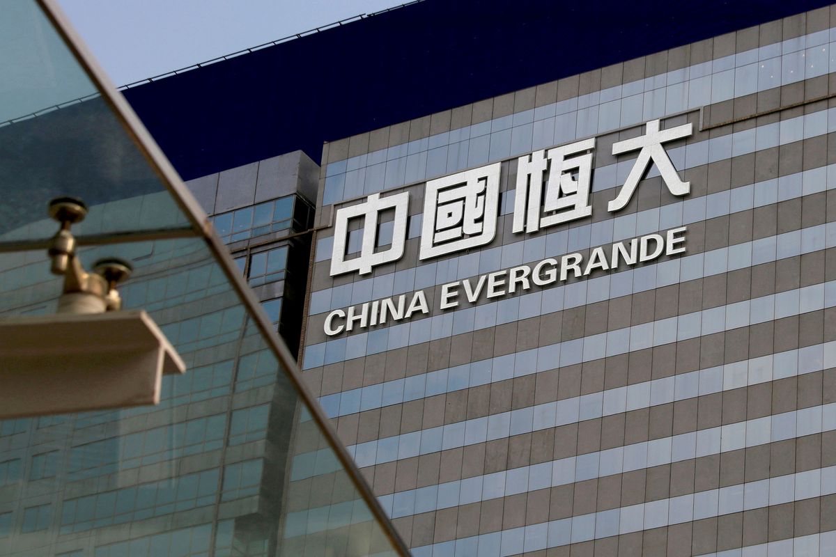 image Evergrande says six execs redeemed investment products in advance