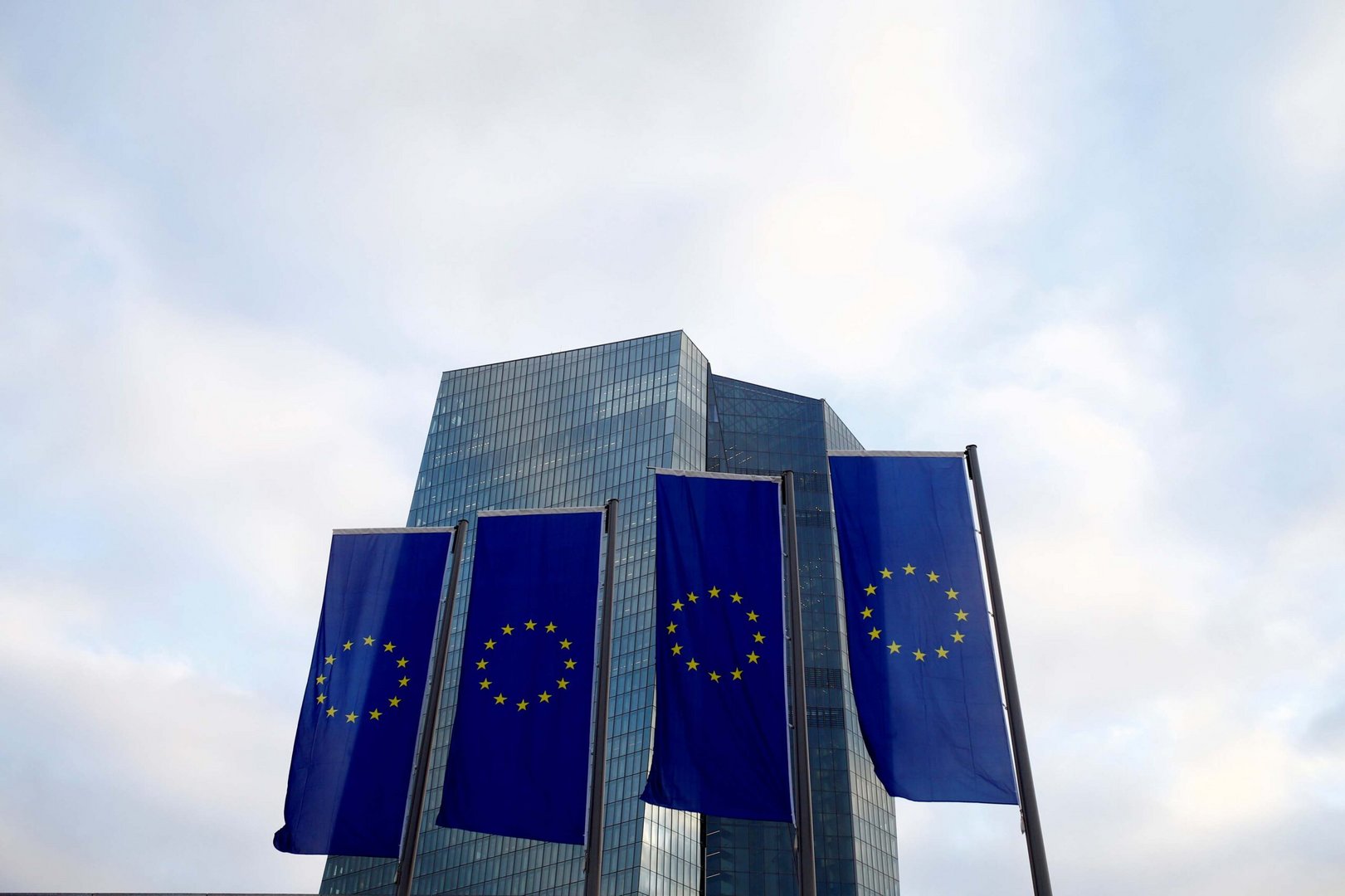 eu flags fly in front of european central bank headquarters in frankfurt