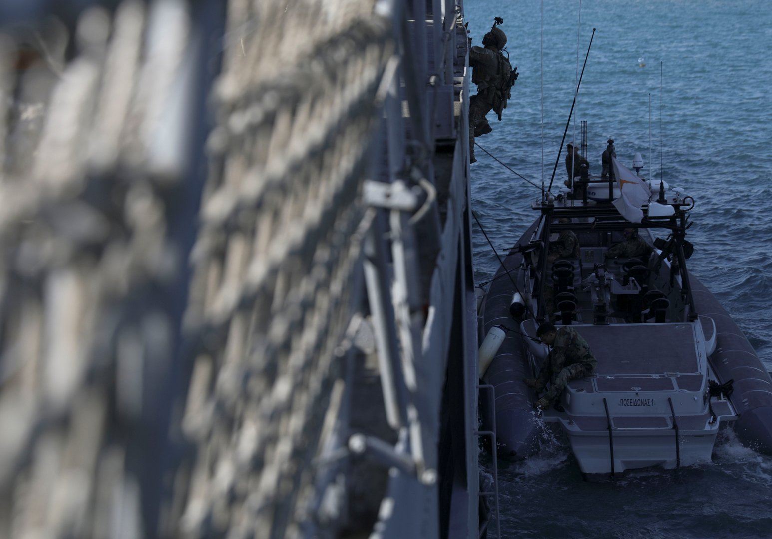 members of the special operations team of the cypriot national guard and u.s. navy seals participate in a joint military training in limassol