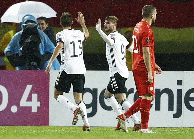 image Germany qualify for World Cup, crucial win for Wales