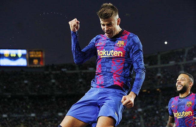 image Pique keeps Barcelona hopes alive in Champions League