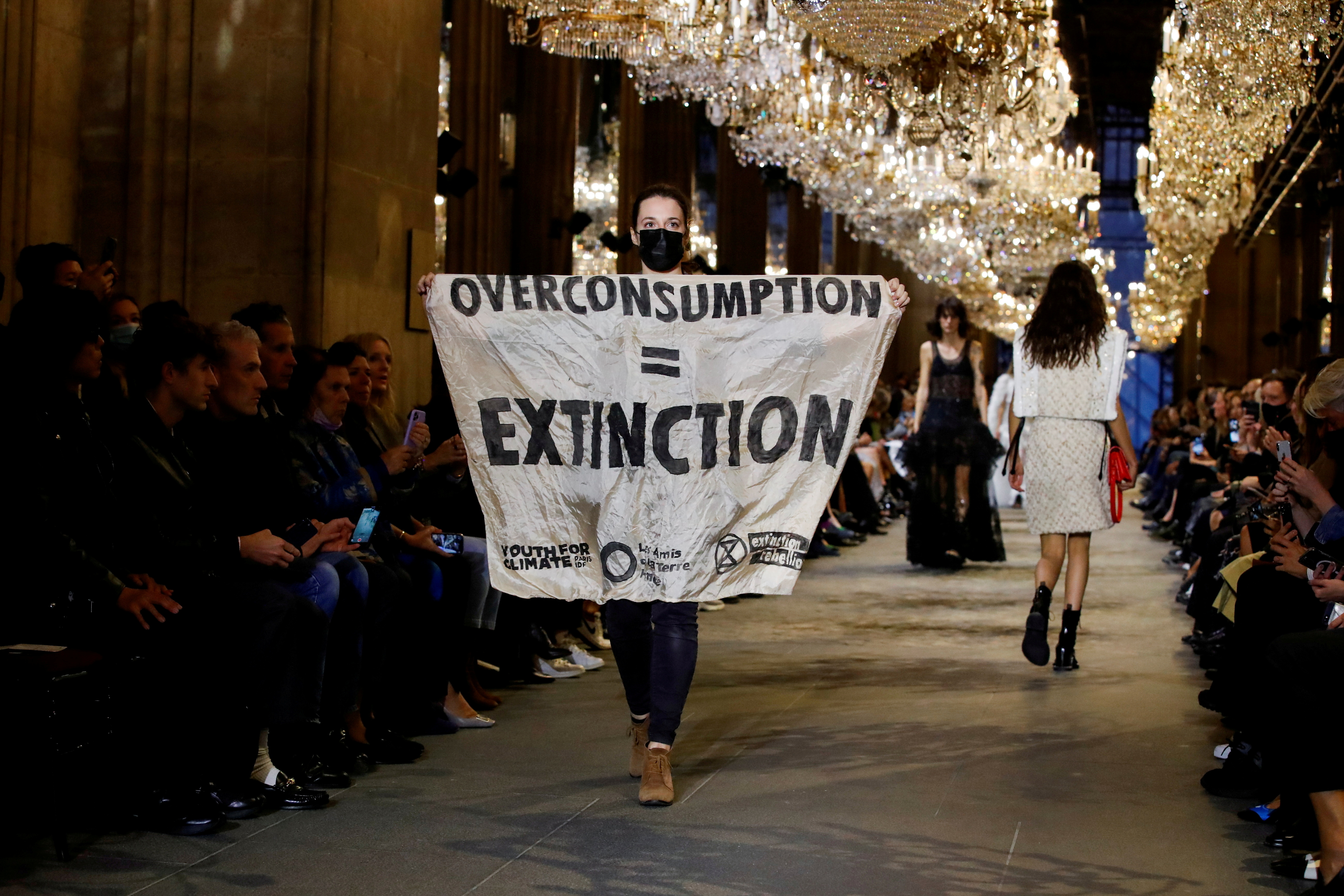 image Green activist hid in Louvre loos before gatecrashing Louis Vuitton&#8217;s show