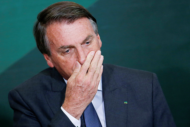 image Brazil police seizing Bolsonaro passport, arresting close aides