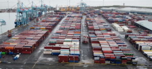 general view of stacked shipping containers at peel ports liverpool docks in liverpool