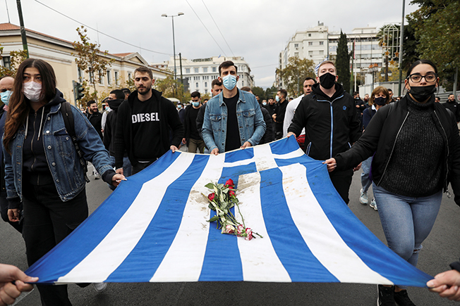 image Greeks march to mark anniversary of 1973 student revolt