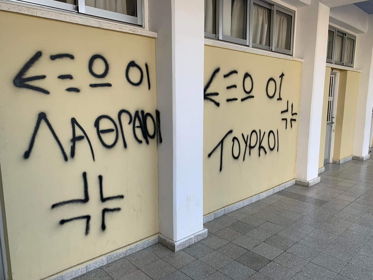 image Vandals spray nationalist and racist slogans all over Nicosia technical school