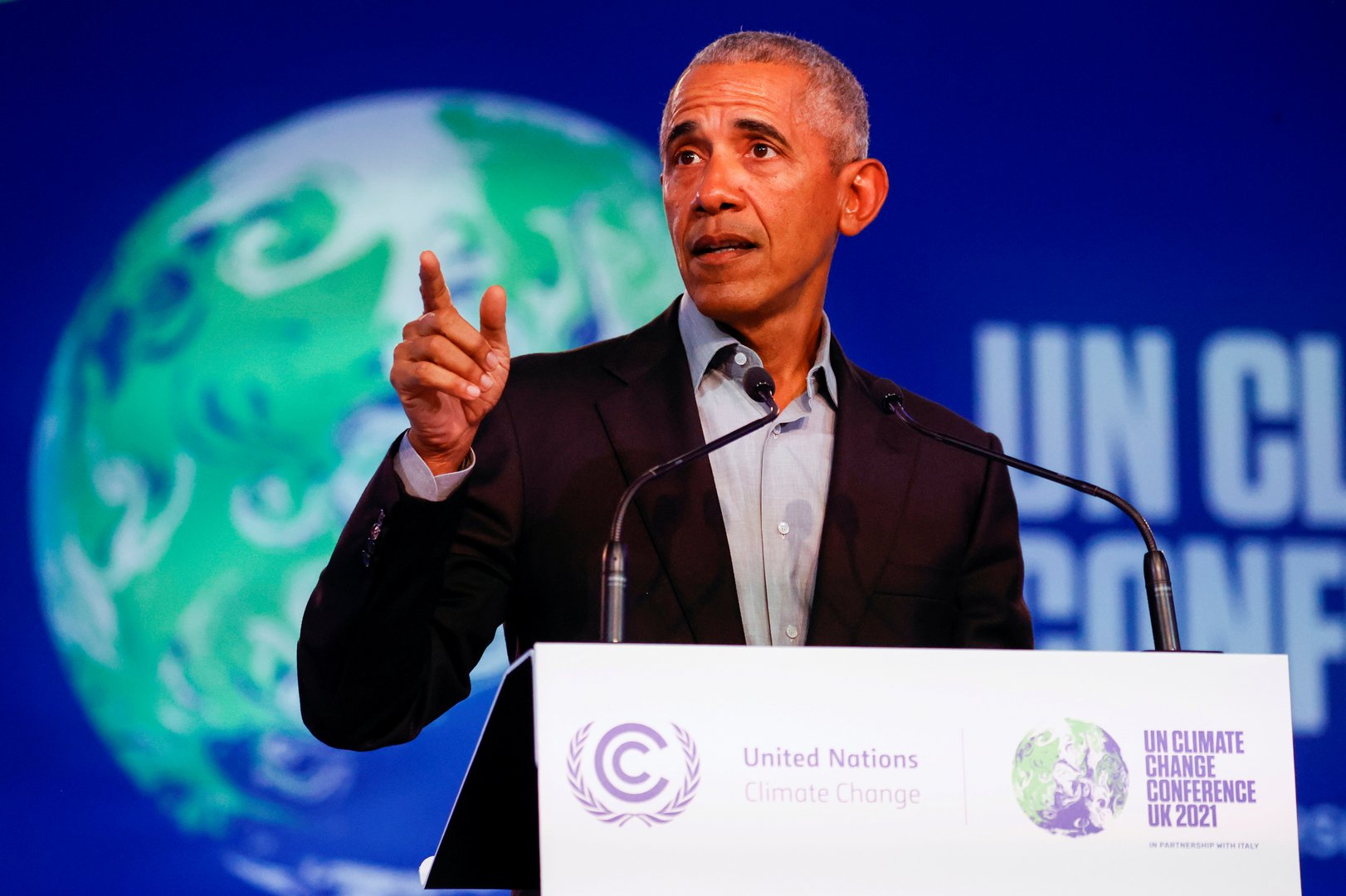 image Obama tells COP26 to help poor nations, chides China and Russia