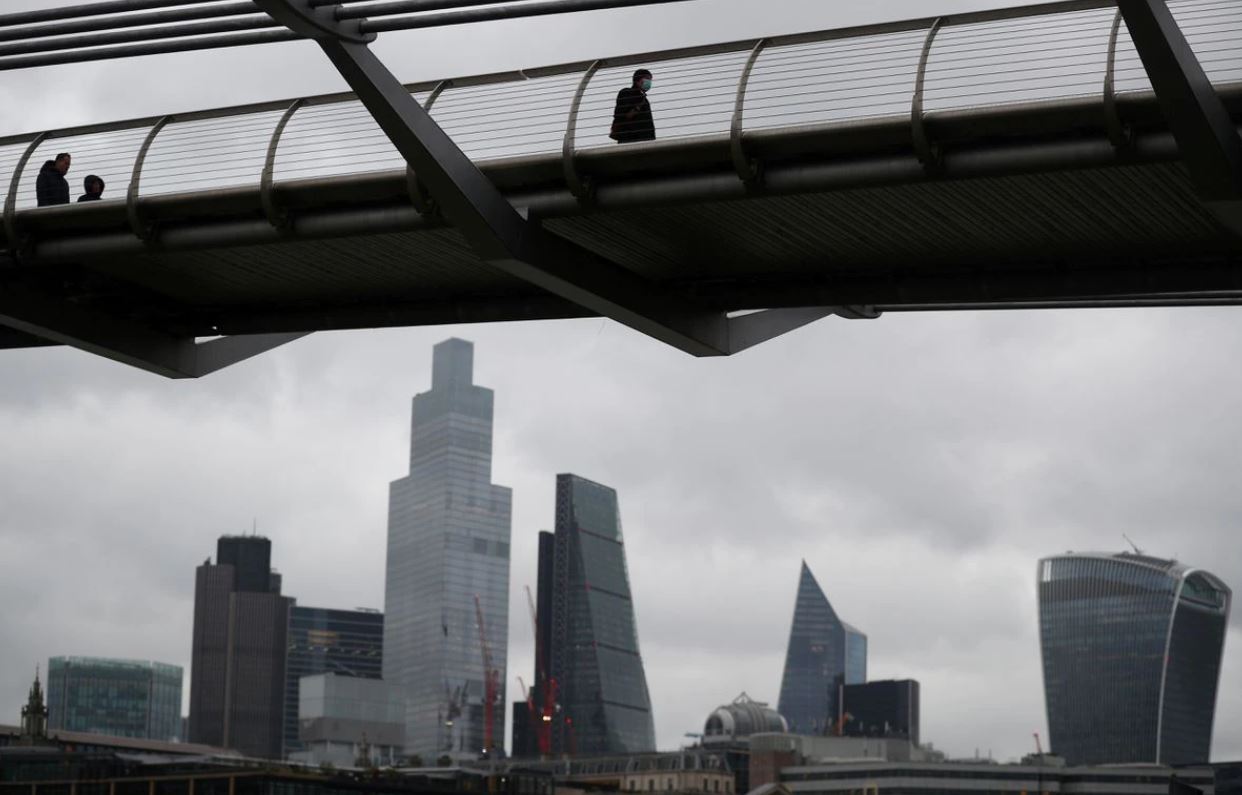 image UK economy grew more slowly than thought before Omicron hit