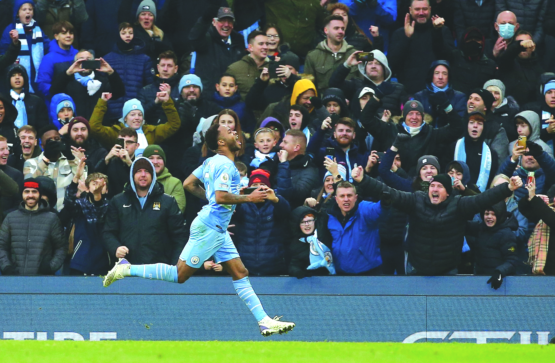 image Sterling penalty earns leaders Man City win over 10-man Wolves