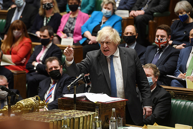 image After stinging revolt, UK PM Johnson defends Covid record