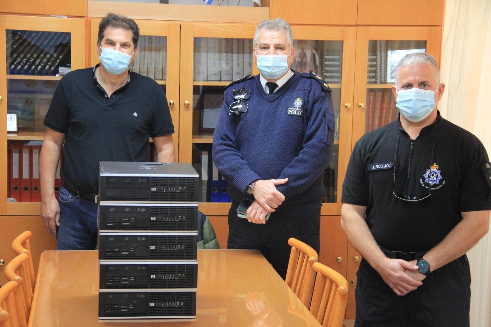 image Bases police donate seized computers to schools