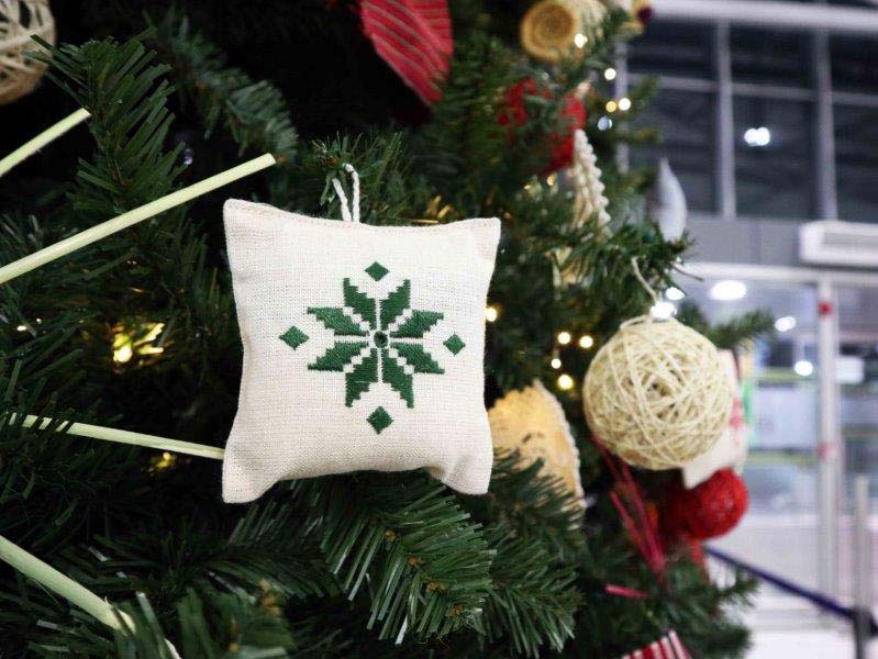 image Airport Christmas tree adorned with handmade ornaments, Lefkara lace