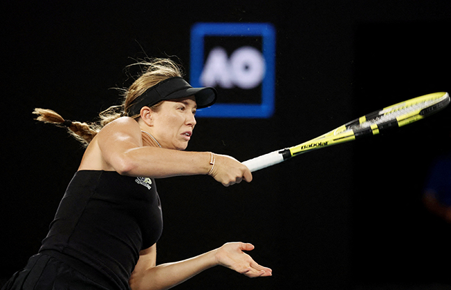 image Collins crushes Swiatek to set up Barty final