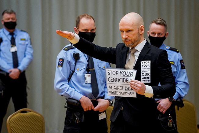 image Norwegian killer Breivik begins parole hearing with Nazi salute