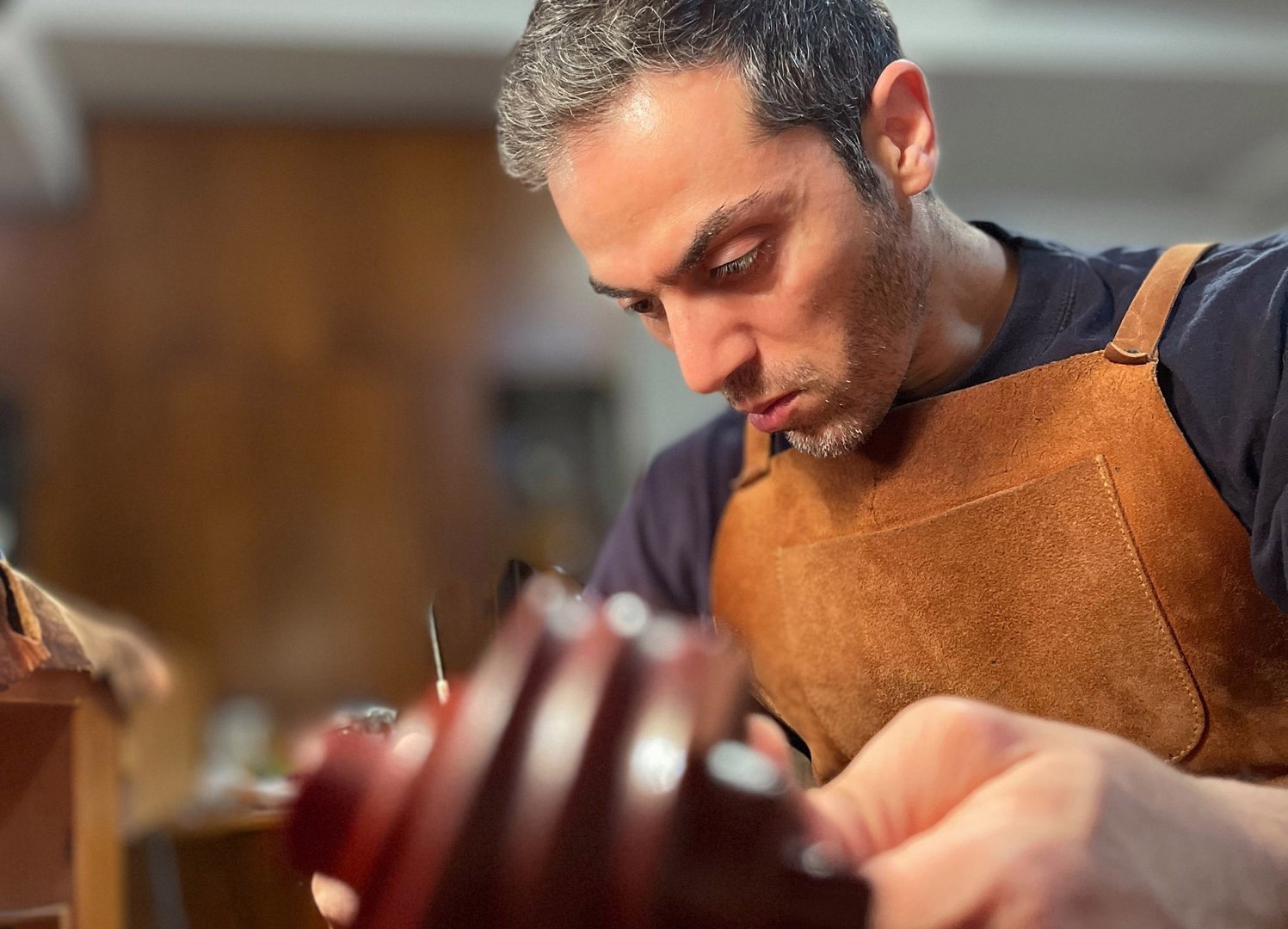 image Local violin maker tunes into tradition