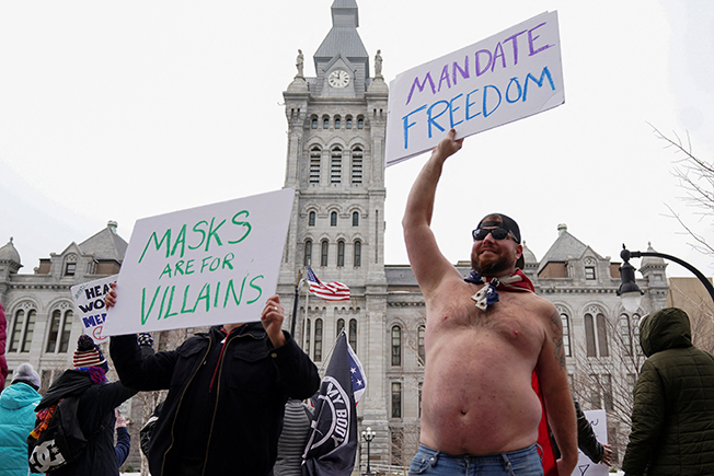 image US eases COVID indoor mask guidelines for most of country