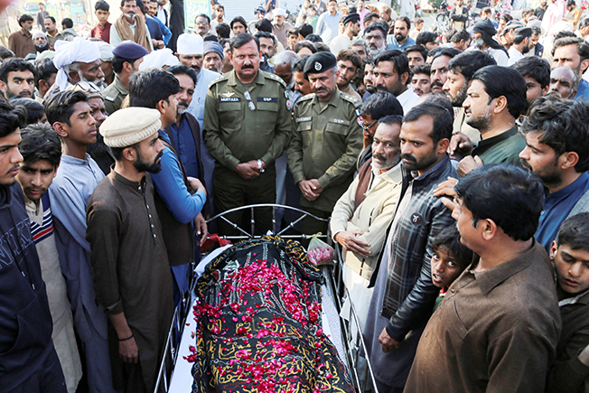 image Man lynched by villagers over allegations of blasphemy in Pakistan