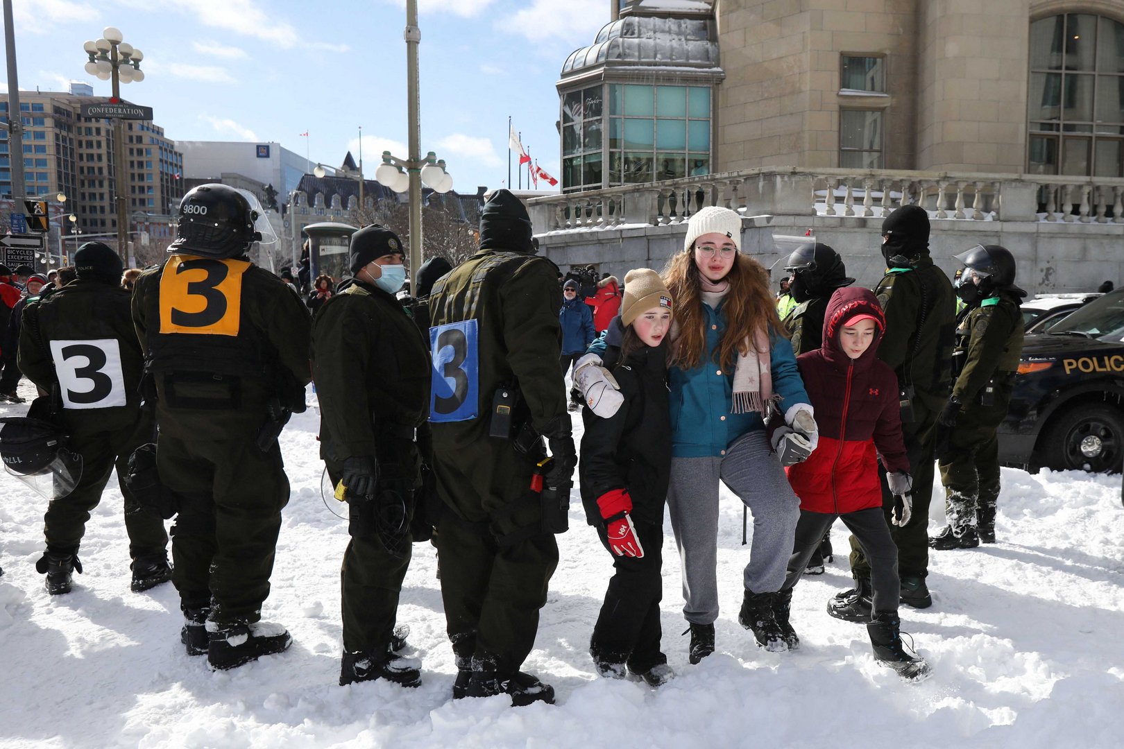 image Canada police tow trucks, step up arrests to clear Ottawa protests
