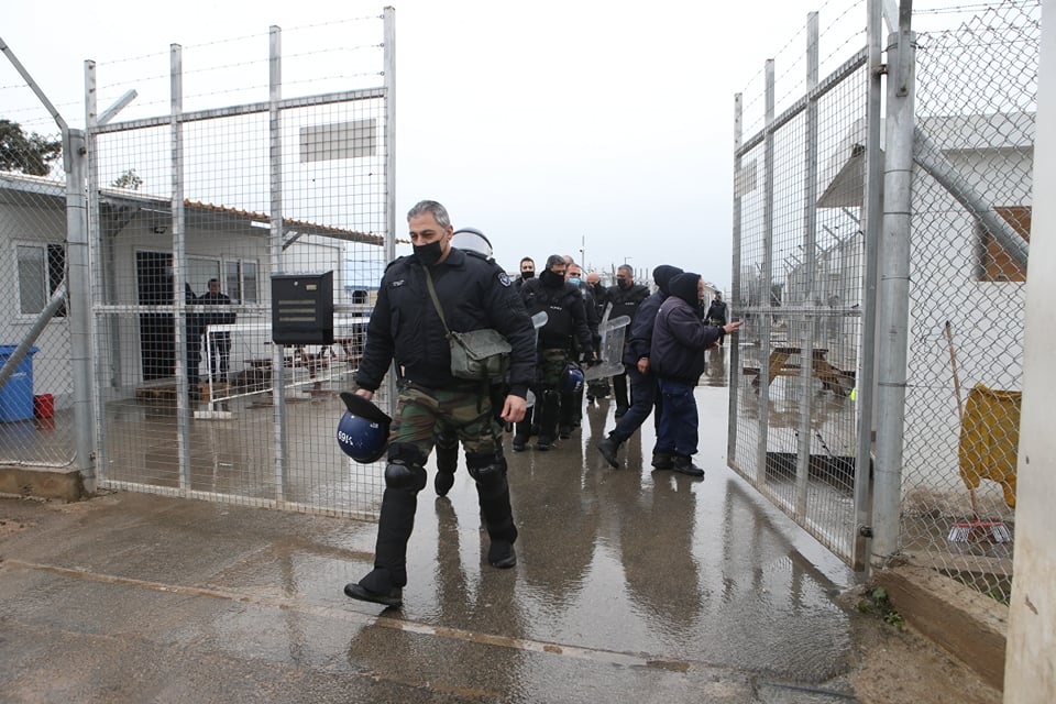 anti riot police arriving at the reception centre
