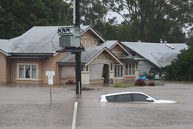 image People flee to rooftops as &#8216;weather bomb&#8217; submerges Australian towns