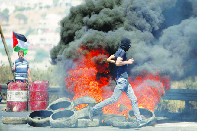 image Amnesty accuses Israel of enforcing &#8216;apartheid&#8217; on Palestinians