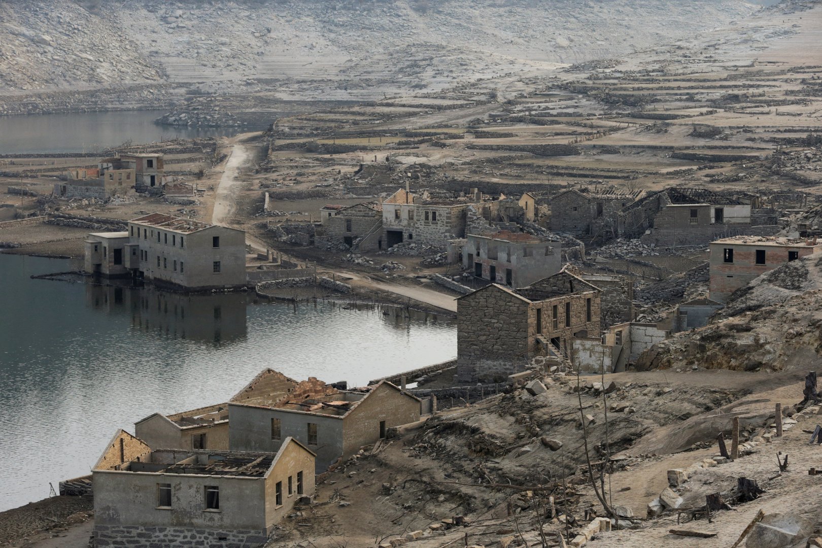 image Ghost village emerges in Spain as drought empties reservoir