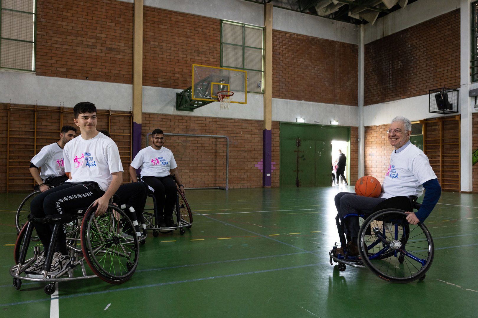 image Education minister in wheelchair basketball game