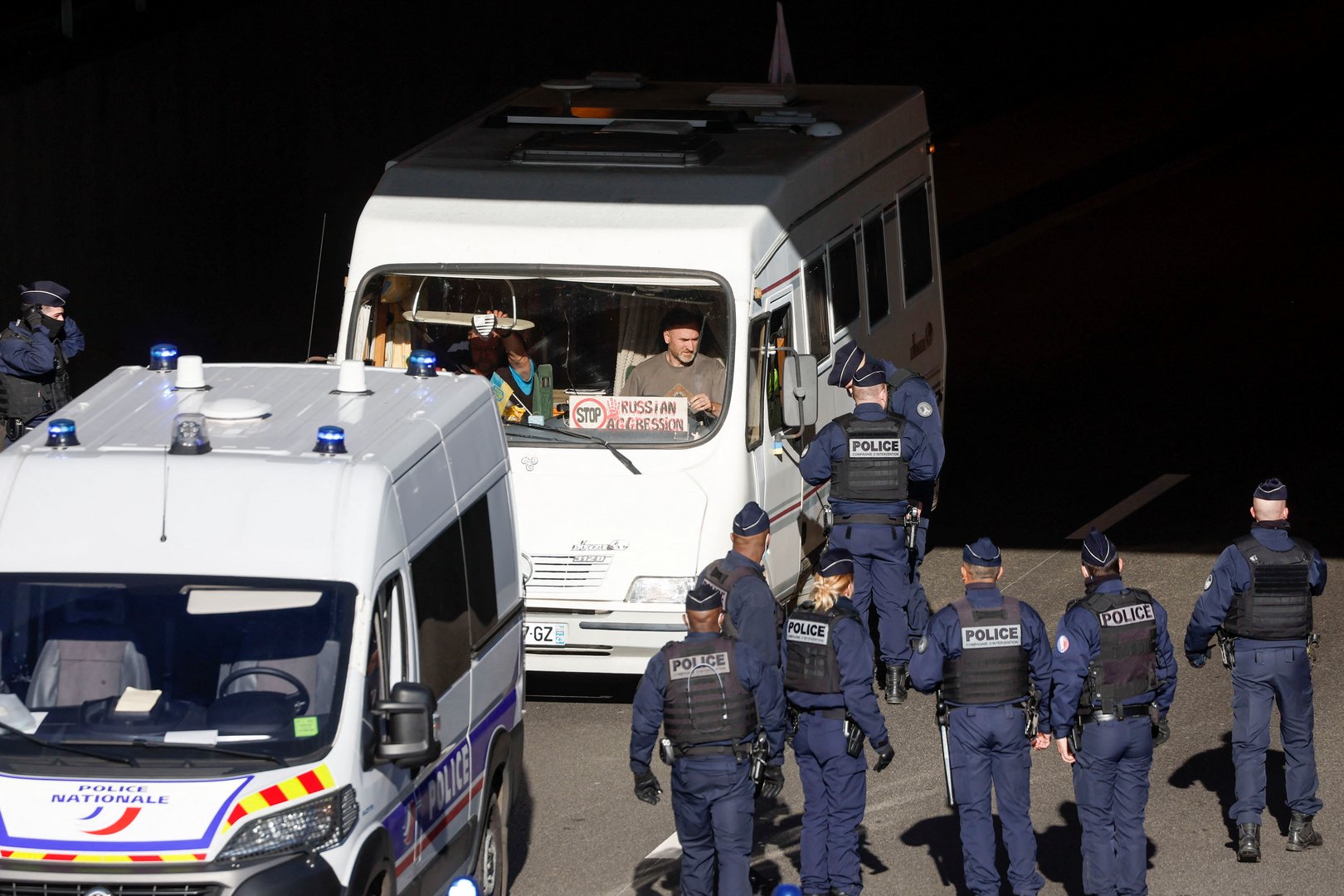 image Police fire tear gas as anti-restrictions &#8220;Freedom Convoy&#8221; enters Paris