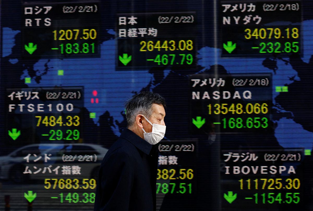 image Stocks dive, oil jumps above $100 as Russia invades Ukraine