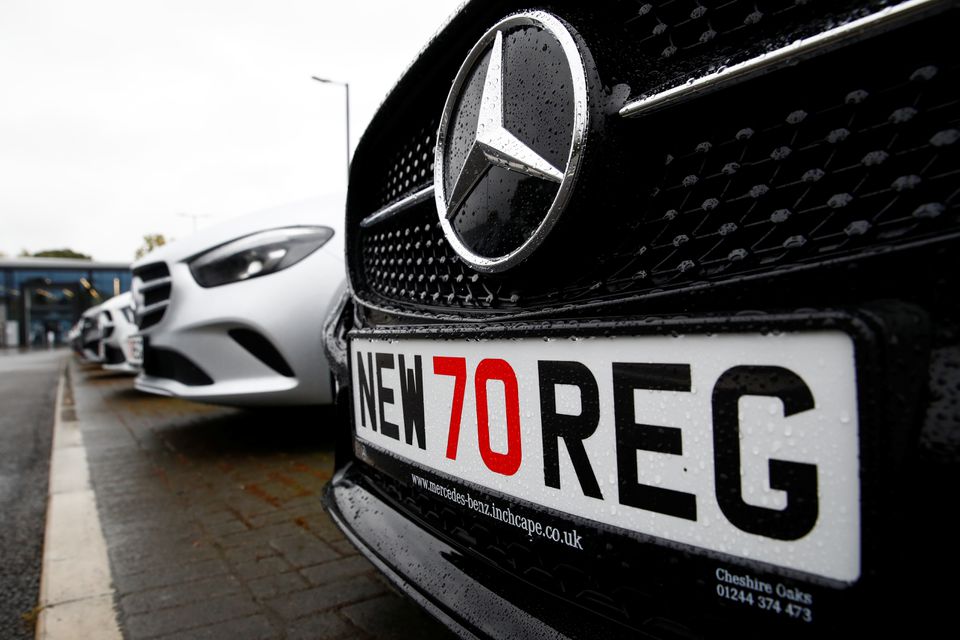 image UK auto industry cuts 2022 sales forecast due to income squeeze