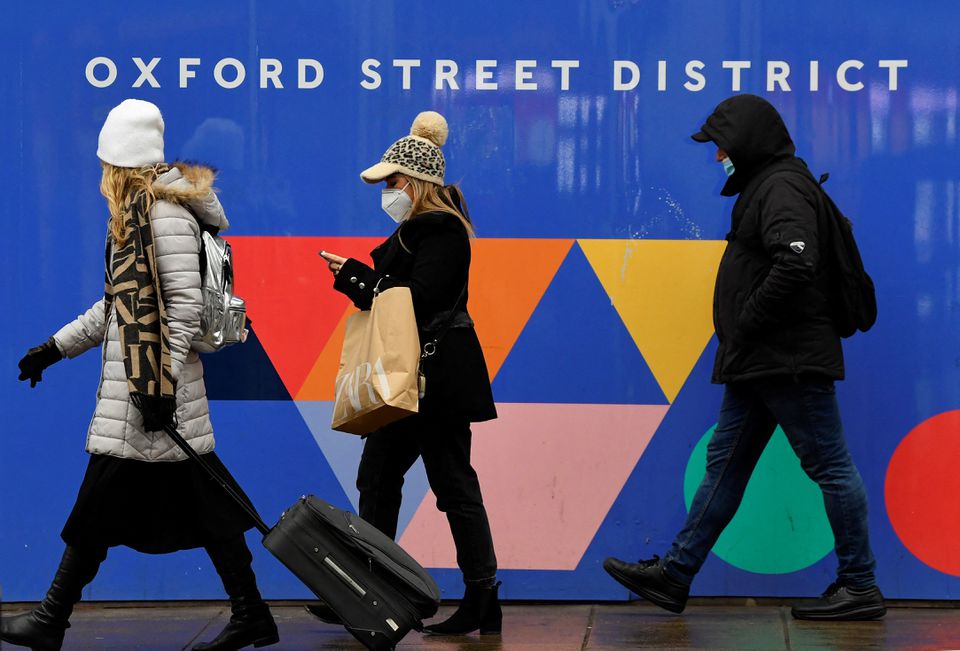 image UK shoppers return to stores after Omicron knock