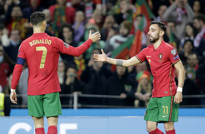 image Portugal and Poland qualify for World Cup