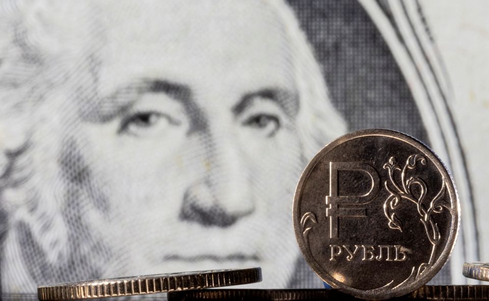 image Russian rouble slips past 100 vs dollar, banks hunt for FX