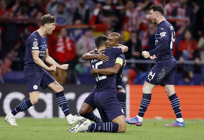 image Man City and Liverpool through to Champions League semis