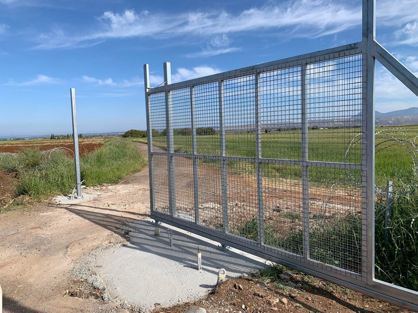 image Metal gates being installed near Astromeritis buffer zone