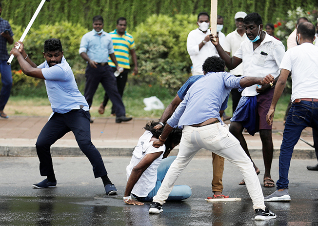 image Sri Lanka prime minister resigns, curfew imposed after clashes (Updated)