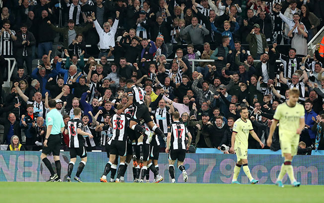 image Arsenal falter in Champions League race with defeat to Newcastle