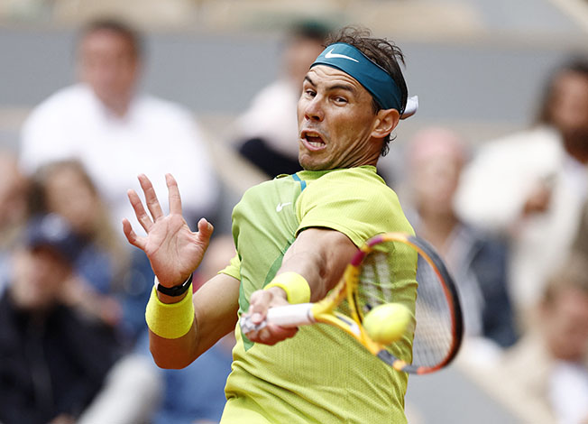 image Nadal through on day of upsets at Roland Garros